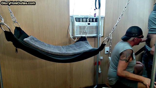 Mature daddy with tattoos and moustache fucked in sling