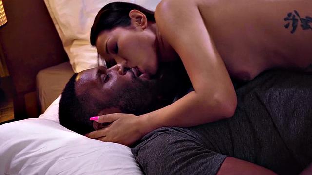 Hot Asian babe gives a sensual BJ before riding a black rod in doggystyle