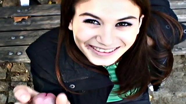 Nice guy bangs a wet pussy in public park, with a smile on her face