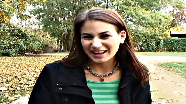 Nice guy bangs a wet pussy in public park, with a smile on her face