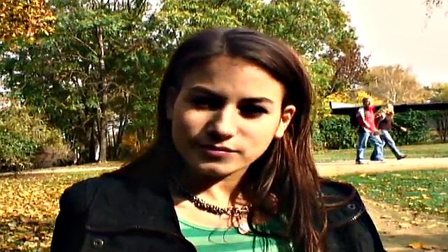 Nice guy bangs a wet pussy in public park, with a smile on her face