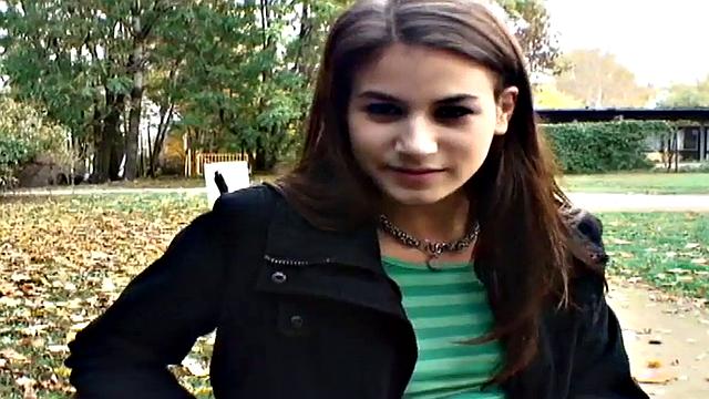 Nice guy bangs a wet pussy in public park, with a smile on her face