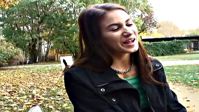 Nice guy bangs a wet pussy in public park, with a smile on her face