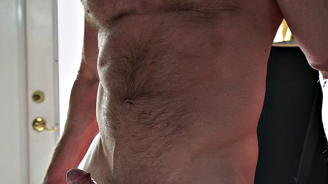 A tattooed hunk pound his guy in the ass while he watches in the living room