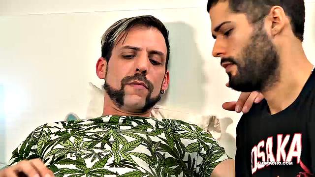 Inked Latino Joris is on his bed and a well-placed hand from Zoe gets things started. Soon Zoe has a big uncut cock in his mouth, while he strokes his own.