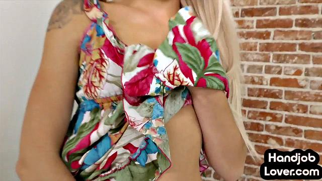 Beautiful petite blondie wanking a dick