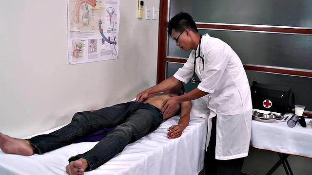Asian doctor rims patients after anal examination