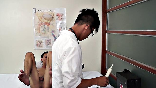 Asian doctor rims patients after anal examination