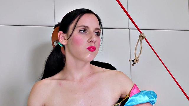 Brunette sub gets her tight ass stuffed with toys while being dominated in mask & dress