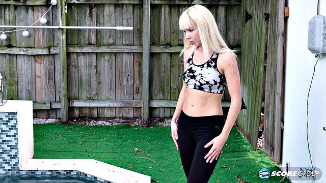 Yoga Sveera stretches outside and then loses her clothes, spreads and fingers her snatch.