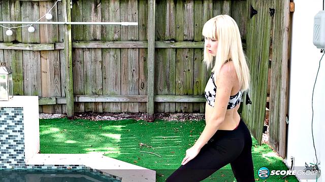 Yoga Sveera stretches outside and then loses her clothes, spreads and fingers her snatch.