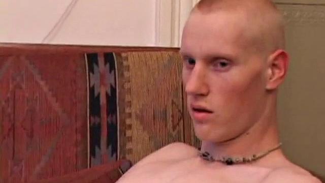 Bummed out by a broken skateboard, Kaos pulls out his lube and pops in a porn video. After stripping naked, he strokes his huge cock and spews a warm cum load onto his chest.