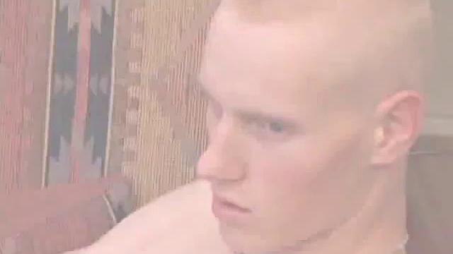 Bummed out by a broken skateboard, Kaos pulls out his lube and pops in a porn video. After stripping naked, he strokes his huge cock and spews a warm cum load onto his chest.