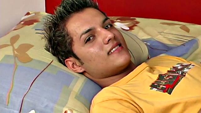 Skinny and smooth Latino jerks off on his bed, showing his bubble butt