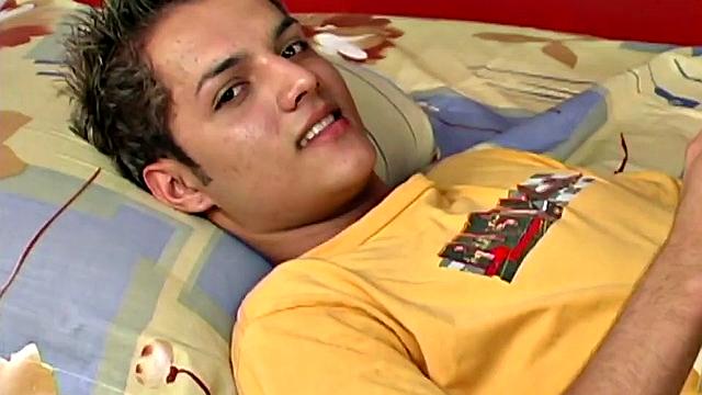 Skinny and smooth Latino jerks off on his bed, showing his bubble butt