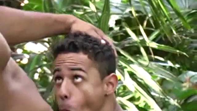 Latino Darrien Leon lurks in the jungle, eager for a chance encounter. He's adorable in his low-rise shorts that get pulled off by Andre Castro. Andre prepares Darrien's ass for fucking by rimming his sweet cheeks.