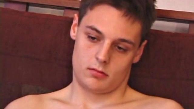 Young stud Gunner Raines needs to release three days of cum, so he puts in a porn video and begins stroking. He plays with his lubed-up cock and soon blasts a warm load onto his tummy. Then Gunner licks up his mess.