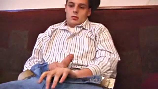 Young stud Gunner Raines needs to release three days of cum, so he puts in a porn video and begins stroking. He plays with his lubed-up cock and soon blasts a warm load onto his tummy. Then Gunner licks up his mess.