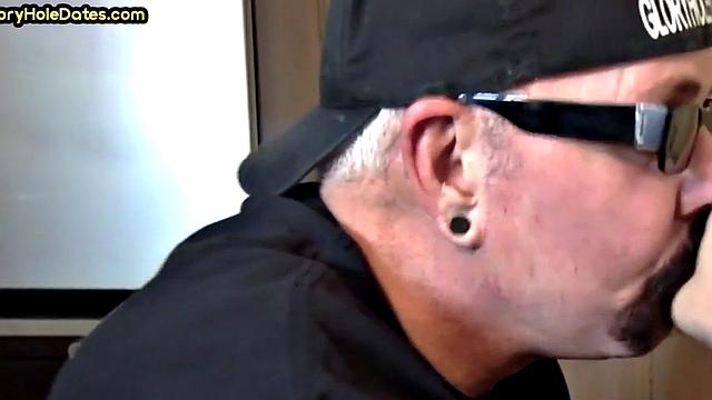 Bearded gloryhole DILF gives 