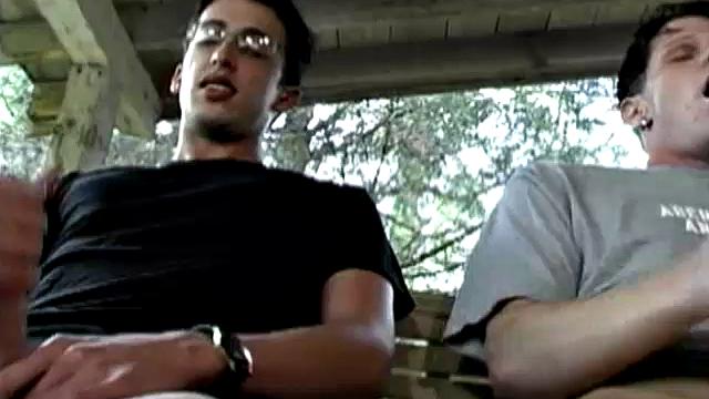 In this hot dual jerk off scene, Chris Cortez and Brayden Knight challenge each other to a jack off contest. The one who cums first is the winner. Seated side-by-side on a swinging love seat, the two whip out their dicks and go to work.