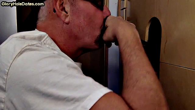 Real gaydaddy sucks black gloryhole dick in video