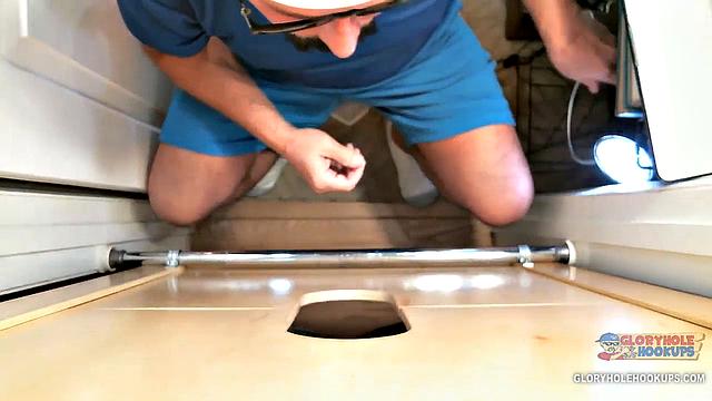Random guy spots the gloryhole and figures why not try his luck with a stranger's cock