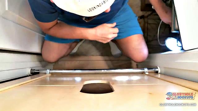 Random guy spots the gloryhole and figures why not try his luck with a stranger's cock