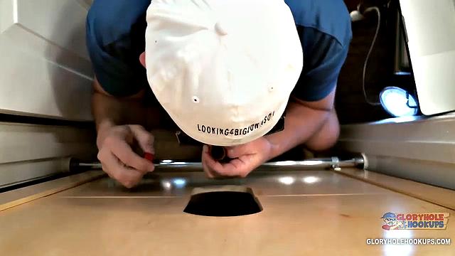 Random guy spots the gloryhole and figures why not try his luck with a stranger's cock
