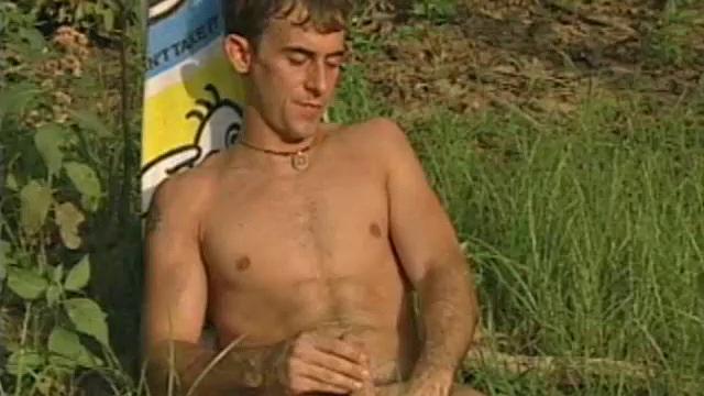 This sexy solo jerk off session features 24 year old Bo Scott. After skinny dipping in the lake, Bo moves to a secluded area on shore.