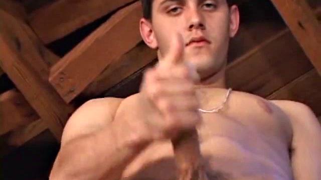 Looking in on TJ Kummings, he decides to get creative, while jacking off. We find the young man jerking off in the garage loft, and after he squeezes and pulls on his cock for a while TJ drops a cum load to the floor.