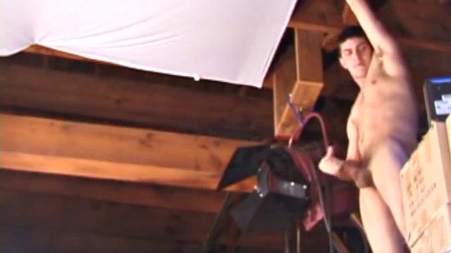 Looking in on TJ Kummings, he decides to get creative, while jacking off. We find the young man jerking off in the garage loft, and after he squeezes and pulls on his cock for a while TJ drops a cum load to the floor.