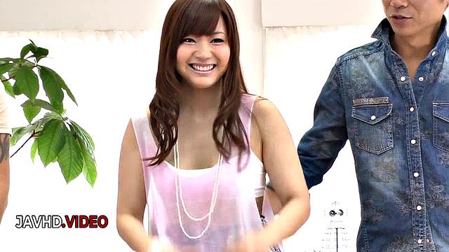 Intense Asian Mayuka Akimoto Gives Two Big Cocks A Sultry Blowjob