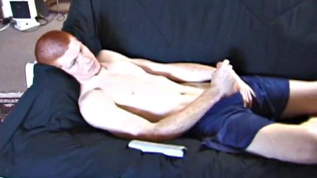 Tristan wastes time getting his dick out of his pants. He watches a porn video, pulling on his growing cock. Once boned up, he strokes with determination and explodes a gusher of warm cum.