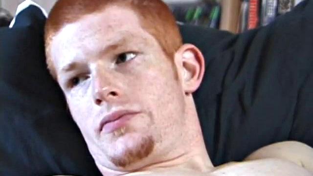 Tristan wastes time getting his dick out of his pants. He watches a porn video, pulling on his growing cock. Once boned up, he strokes with determination and explodes a gusher of warm cum.