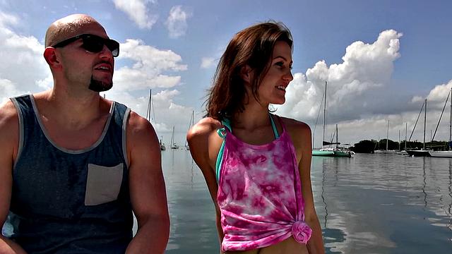 A petite tattooed teen take a deep dicking in the ocean and then get her ass licked outdoors