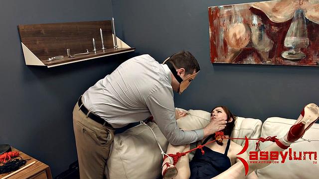 Pretty redhead bound and led for anal sex