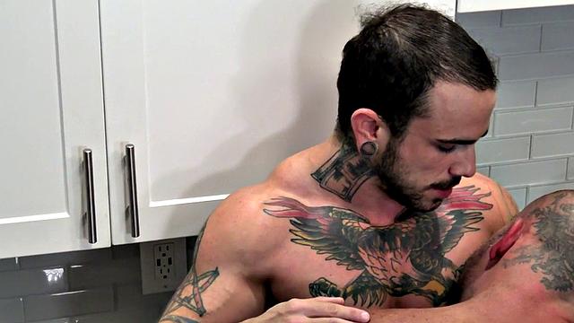 Muscled hunk in kitchen fucks FTM jock with both parts