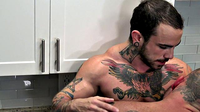 Muscled hunk in kitchen fucks FTM jock with both parts