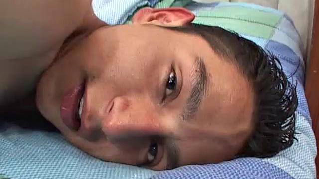 Kevin is a cute Latin twink, with a big fat uncut cock that needs attention. On the bed, he slowly strips and goes to work on his monster.