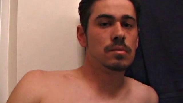 Marcus slips away to the bathroom with his laptop for private time.