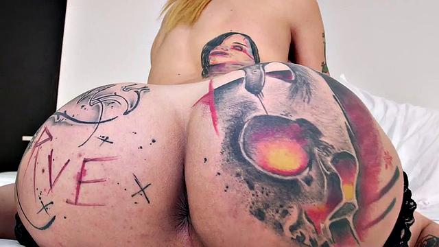 Blonde with big tits and ass tugging on a huge dick in lingerie