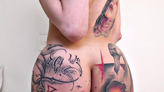 Blonde with big tits and ass tugging on a huge dick in lingerie