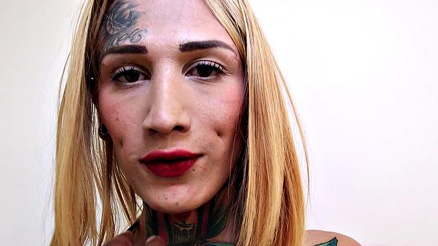 Blonde with big tits and ass tugging on a huge dick in lingerie