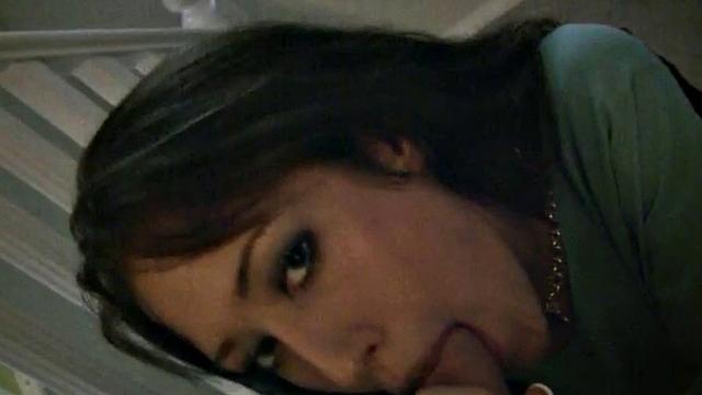 Horny slut sucking on hard dick on stairwell