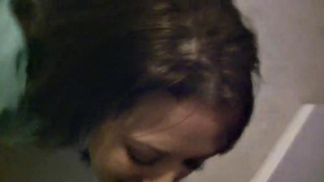 Horny slut sucking on hard dick on stairwell