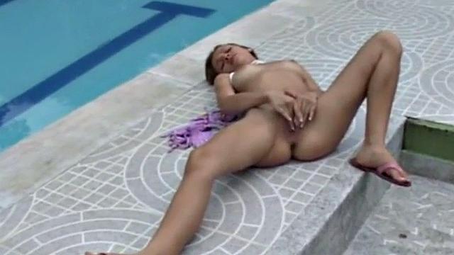 Poolside teen babe fingers herself