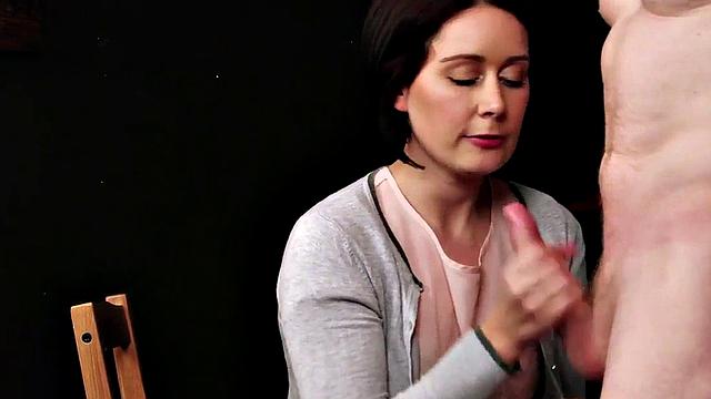 A British MILF in high heels and stockings give a hot handjob and blowjob in a CFNM scene