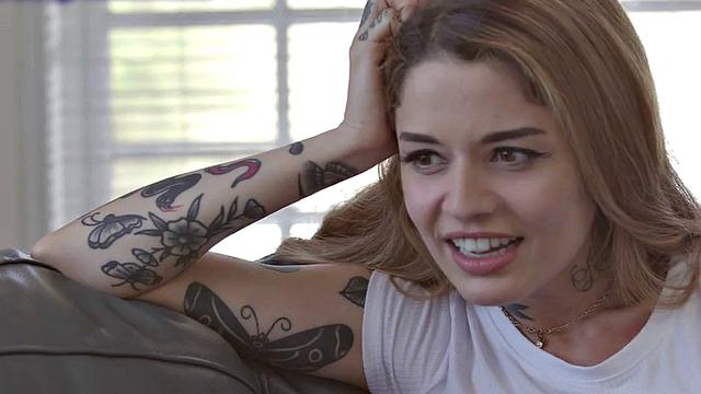 A tattooed slut go wild as she licks and kisses her GF's wet pussy with Hitachi