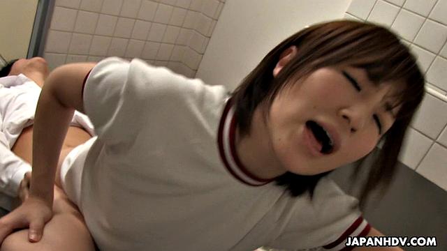 School girl Kaede Oshiro rides guy at the toilet
