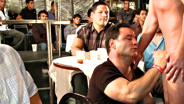 Public DILF sucks cock in strip club in front of viewers